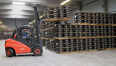 Forklift truck in a warehouse