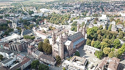 Aerial view of the city of Worms: cathedral, historic buildings, market square, houses, and trees