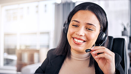 Smiling women with headset