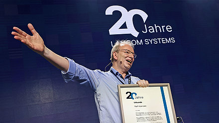 Founder Ralf Koenzen with "20 years of LANCOM Certificate"