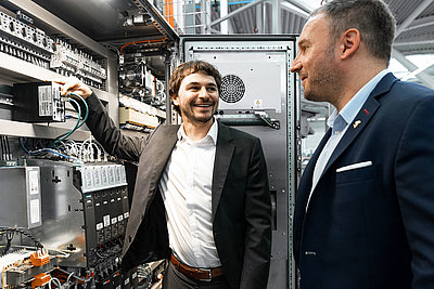 Markus Irle, Vice President Firewall and Security with IT colleagues in firewall server room