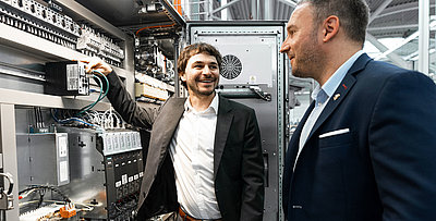 Know exactly what protection your business needs Markus Irle, Vice President Firewall and Security with IT colleagues in firewall server room