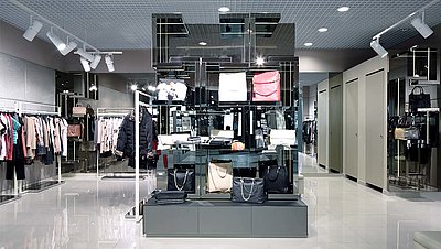 Fashion store with rented sales space for a shop-in-shop shelf of a brand bag manufacturer