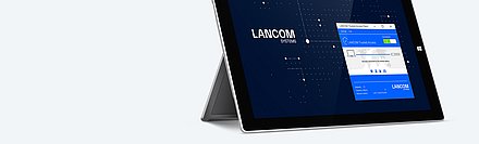 Banner image with a MacBook set up, showing the user interface of the LANCOM Trusted Access Client