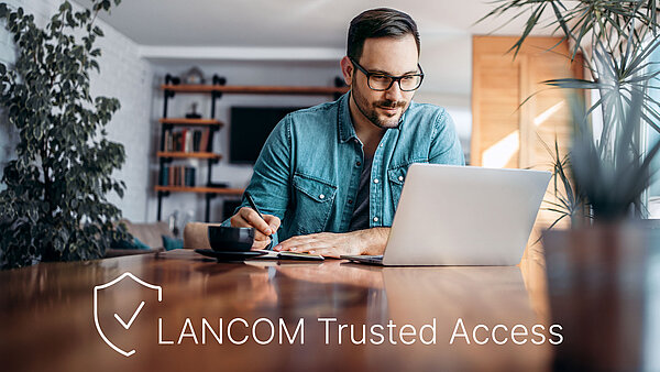 Man sitting at his laptop in his home office, with the words "LANCOM Trusted Access" at the bottom