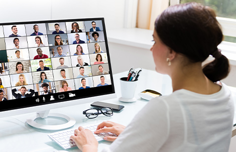 VPN solutions for every demand - as much home office as you need Woman in front of screen in home office communicates with many people via video conference